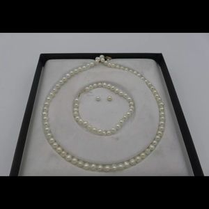 Genuine pearl necklace bracelet and  earrings